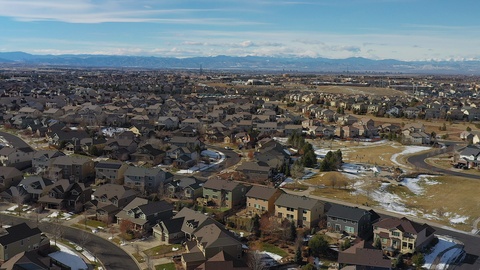 Panning aerial footage captured in Southeast Aurora, Colorado over the