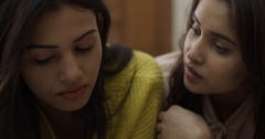 Two young Indian beautiful female friends in bed [129205552] | 写真素材・ストックフォトのアフロ