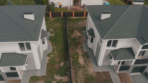 Aerial view classical townhouses. Duplexes