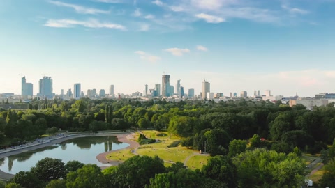 Pole Mokotowskie Warsaw Park field with lake and city aerial view