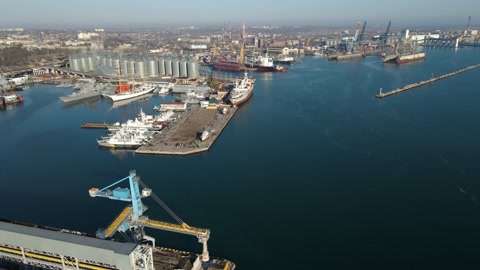 Aerial view of a cargo ship in the port dock Trade Export. Loading and unload