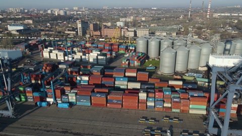 Aerial view of a cargo ship in the port dock Trade Export. Loading and unload