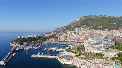 Monte Carlo, Monaco: Aerial view of famous city towering over Mediterranean Sea