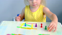 smart little child, girl 2 years plays with educational toy, … [166897340] | 写真素材・ストックフォトのアフロ