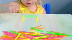 smart little child, girl 2 years plays with educational toy, … [166897329] | 写真素材・ストックフォトのアフロ