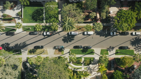 Aerial top down view on city street in prestige neighborhood houses Los Angeles