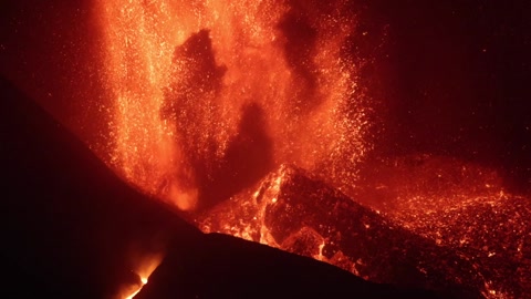 explosive nocturnal volcanic eruption with lava