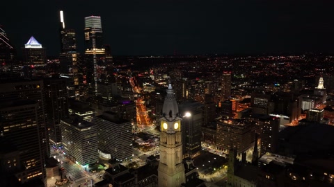 Aerial Drone Flight Through Center City Philadelphia at Night