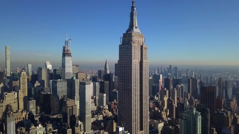 Aerial view around the Empire state building, in sunny New York, USA -