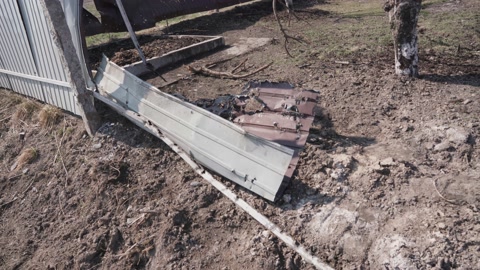 War in Ukraine. The fence was destroyed by a shell explosion