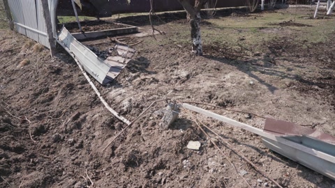 War in Ukraine. The fence was destroyed by a shell explosion