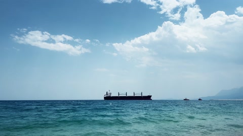 Empty cargo ship tanker , at sea follows in the port. Commercial trade