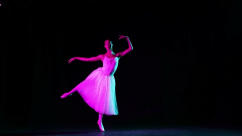 Young and beautiful graceful classical ballet female dancer in white dress