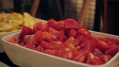 Buffet restaurant. Self-service cafeteria. Chopped tomatoes … [201226398] | 写真素材・ストックフォトのアフロ