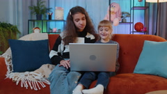 Sisters child kids using laptop, making video webcam conference … [205780224] | 写真素材・ストックフォトのアフロ