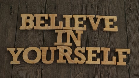 Believe in yourself, text words typography written with wooden letter, life..