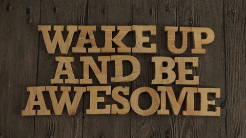 Wake up and be awesome, text words typography written with wooden letter, l..