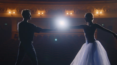 Pair of classical ballet dancers on rehearsal