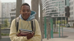 Portrait of African American Preteen Boy with Student Books … [222492577] | 写真素材・ストックフォトのアフロ 