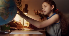 Smiling smart preteen school girl pupil studying at home sitting … [248349945] | 写真素材・ストックフォトのアフロ 