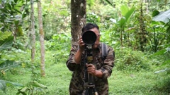 Yogyakarta, Indonesia - 06/03/2024: wildlife photographer using … [255501948] | 写真素材・ストックフォトのアフロ